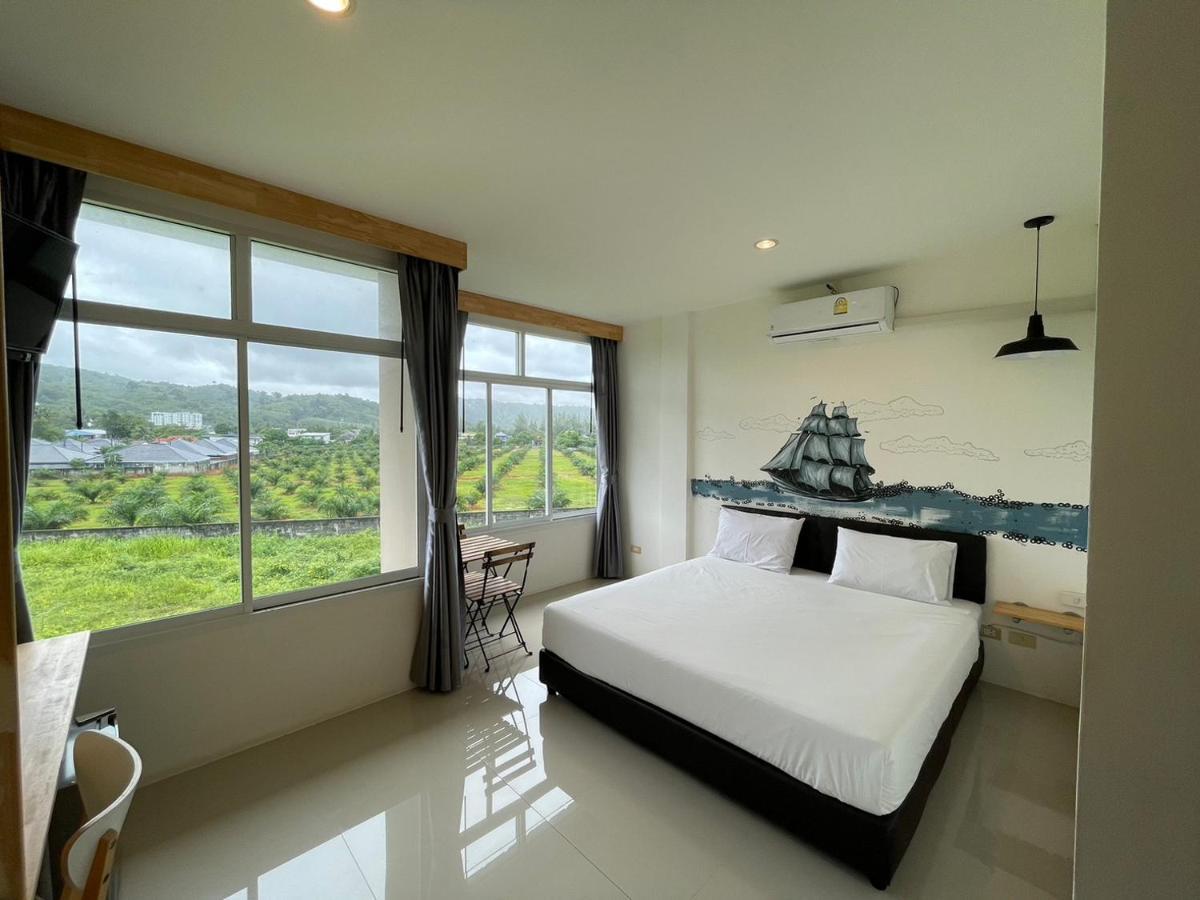 Dwell Phuket Airport Hotel At Naiyang Nai Yang Beach Exterior foto